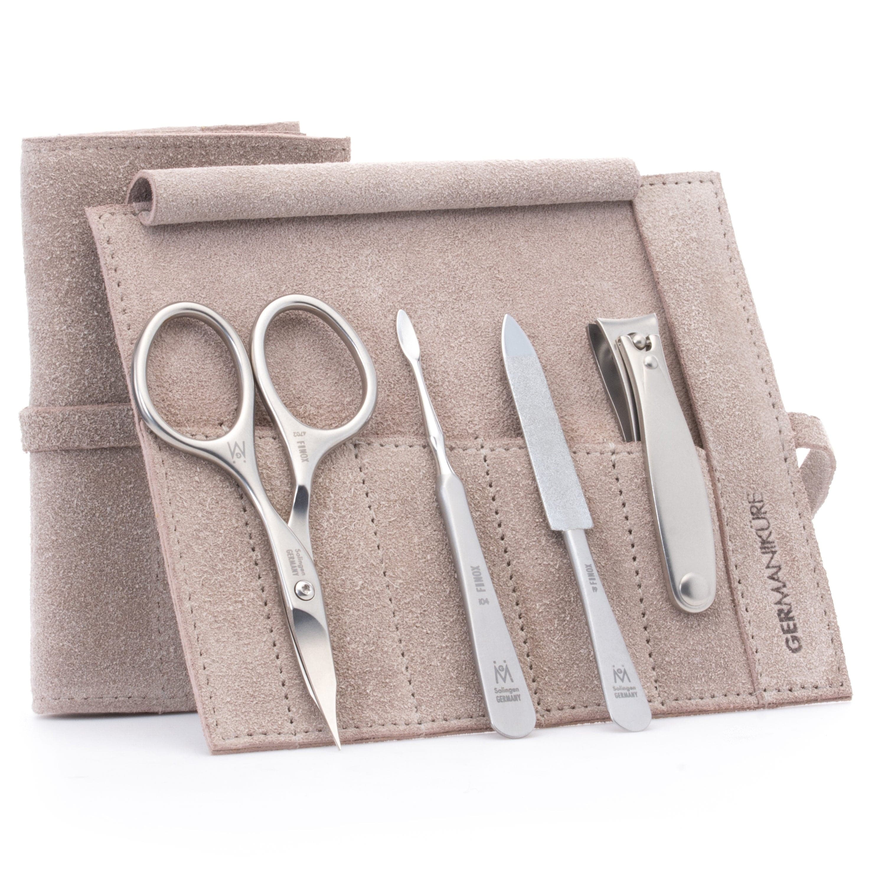 4 Piece Manicure Set: Nail Clipper, Combination Scissor, Sapphire File, and Nail Cleaner image #1